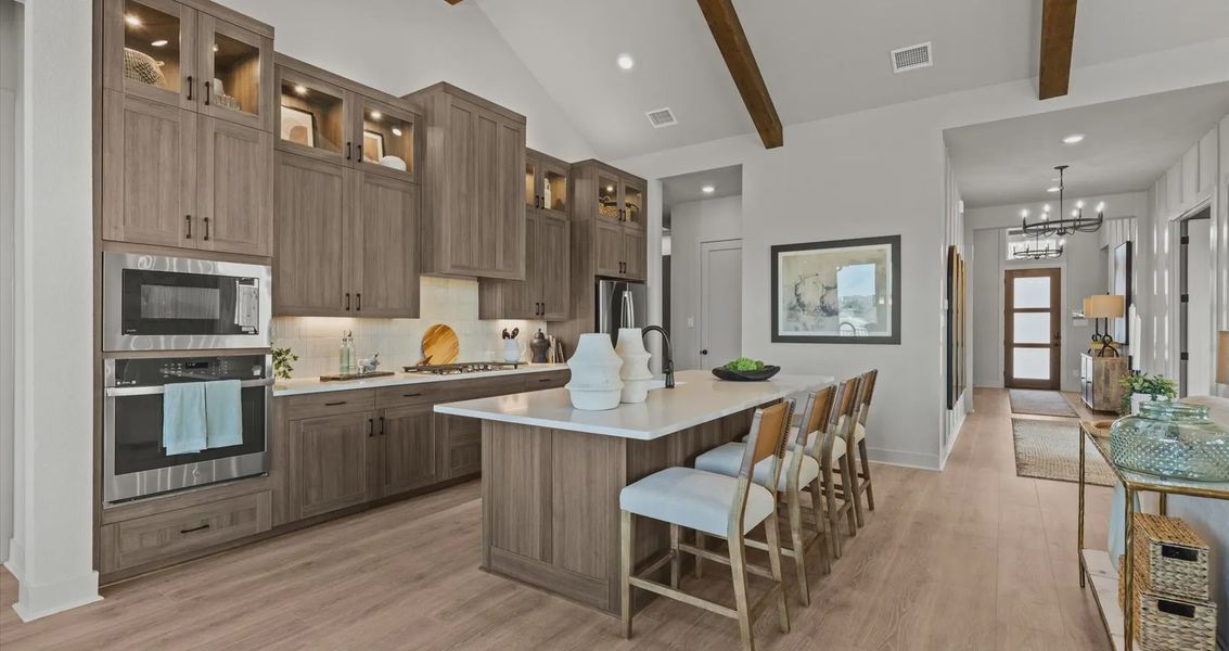 Representative furnished interior of a home built from the Malia by Chesmar Homes in 6 Creeks, Kyle (Image 6).