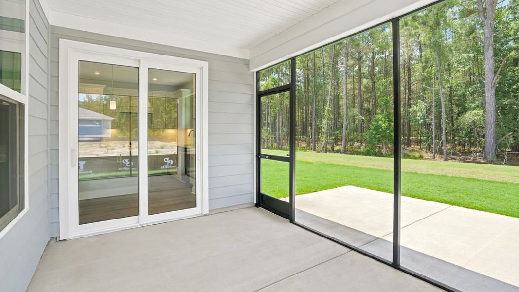 Exterior details and patio area of a home in Sun City Hilton Head, Bluffton (Image 24).