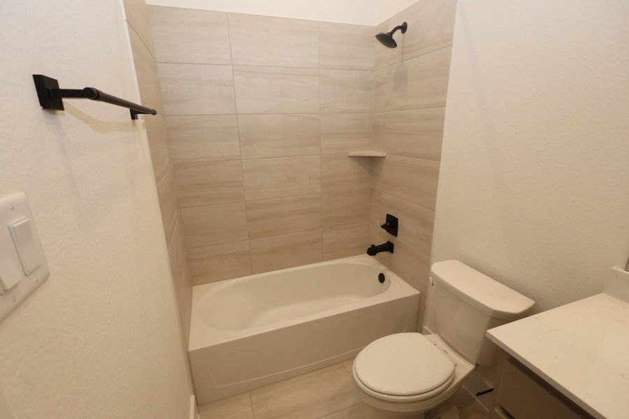 Furnished interior view inside a new home in Dunham Pointe, Cypress (Image 11).