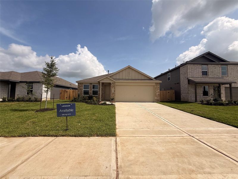 Front exterior of a new home in Sweetgrass Village, Crosby, TX, highlighting curb appeal (Image 1). Front exterior of a new home in Sweetgrass Village, Crosby, TX, highlighting curb appeal (Image 1).