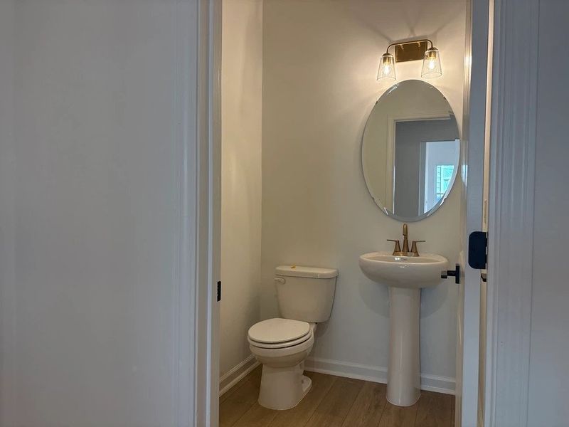 1/2 Bath featuring the AW Collection® Serene - Small, refined space with soft, quiet finishes.