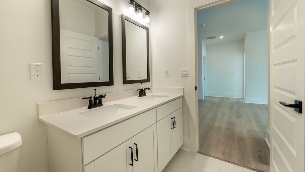 Representative furnished interior of a home built from the Hanover by D.R. Horton in The Village at Sandy Plains, Marietta (Image 13).