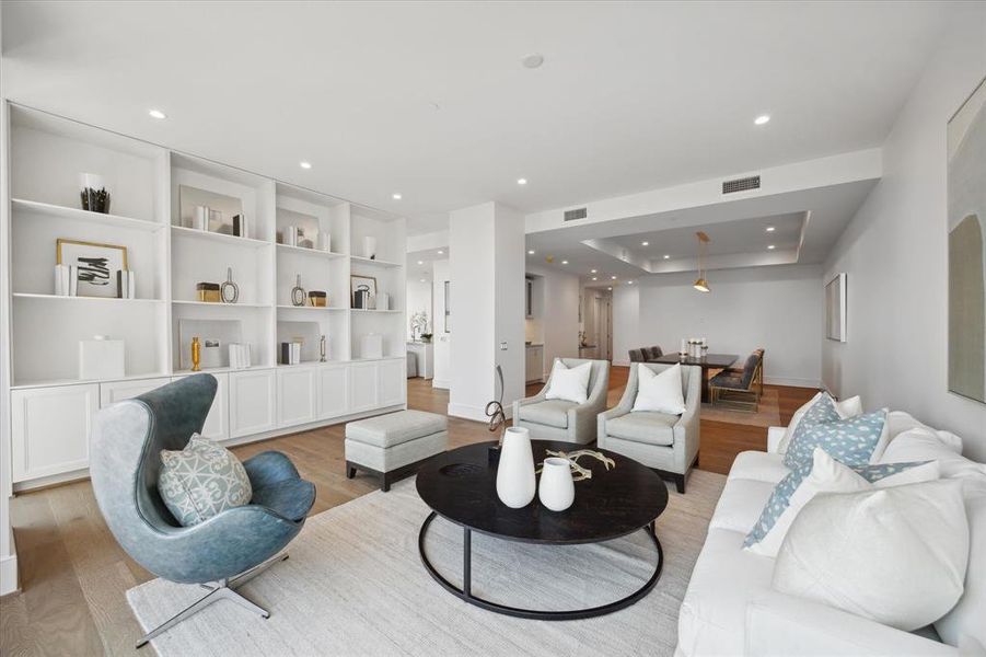 Living room extends from dining room, facing downtown