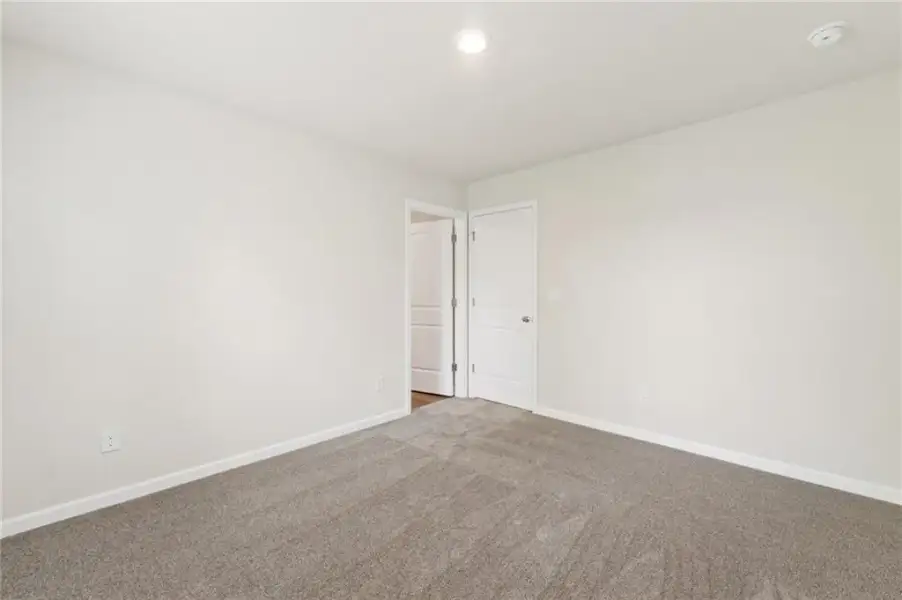 Spacious, unfurnished interior of a new home in Millstone Manor, Conyers (Image 24). Spacious, unfurnished interior of a new home in Millstone Manor, Conyers (Image 24).