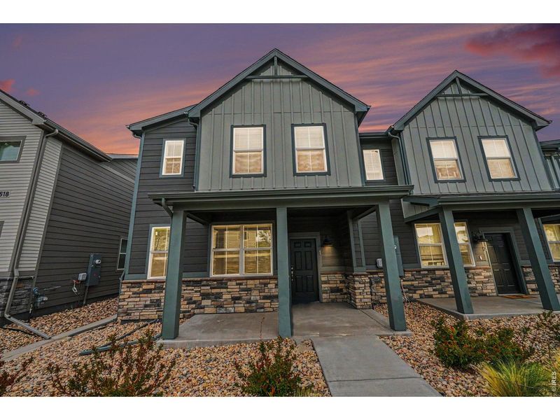 Front exterior of a new home in Poudre Heights: The Meadow Collection, Windsor, CO, highlighting curb appeal (Image 2). Front exterior of a new home in Poudre Heights: The Meadow Collection, Windsor, CO, highlighting curb appeal (Image 2).