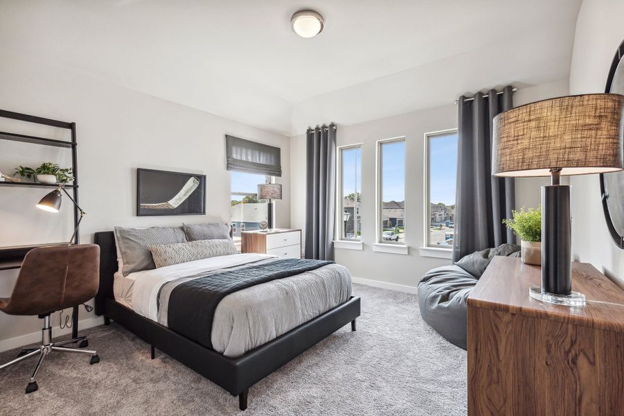 Bedroom in the Wimbledon home plan by Trophy Signature Homes – REPRESENTATIVE PHOTO Bedroom in the Wimbledon home plan by Trophy Signature Homes – REPRESENTATIVE PHOTO