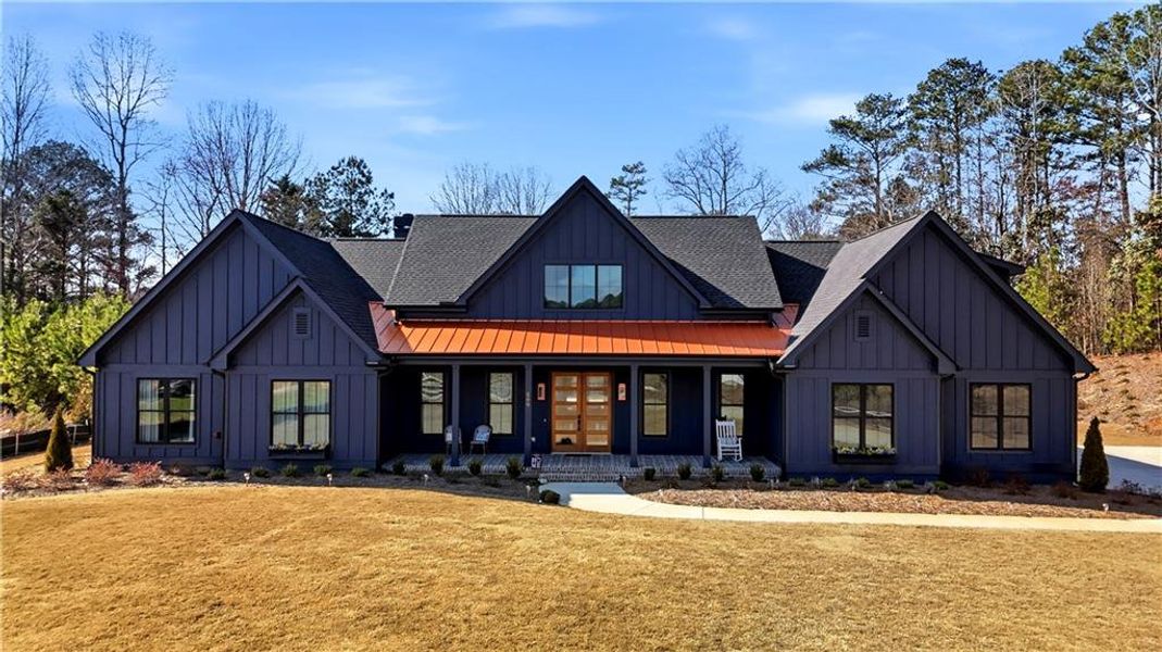 Front exterior of a new home in , Woodstock, GA, highlighting curb appeal (Image 21). Front exterior of a new home in , Woodstock, GA, highlighting curb appeal (Image 21).