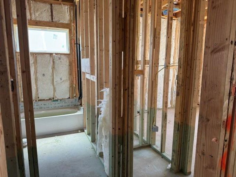 A partially finished bathroom offers potential for personalization and modern design choices.
