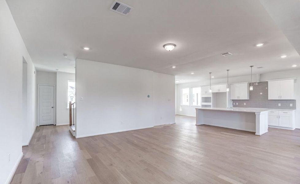 Representative unfurnished interior of a home built from the Breckenridge 3600 SH by Saratoga Homes in Townsen Landing, Humble (Image 8).