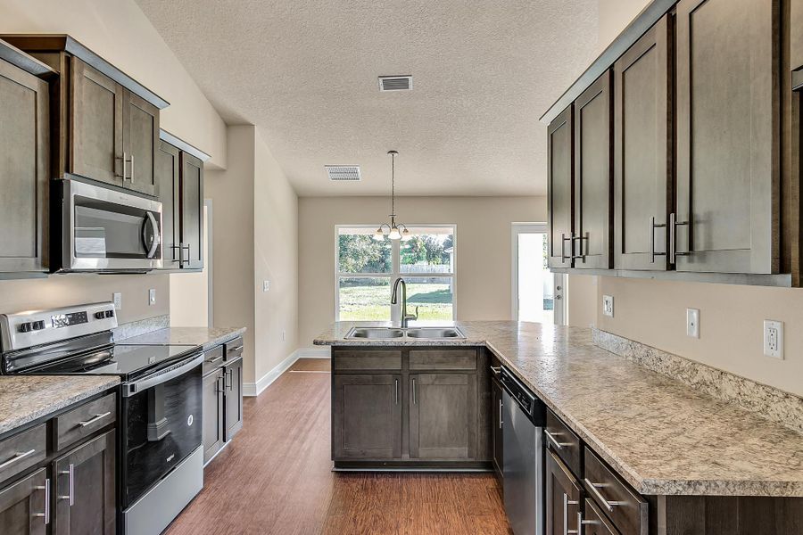 Furnished interior view inside a new home in Spring Hill, Spring Hill (Image 3).