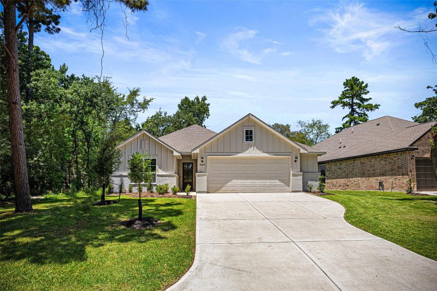Front exterior of a new home in , Montgomery, TX, highlighting curb appeal (Image 18). Front exterior of a new home in , Montgomery, TX, highlighting curb appeal (Image 18).