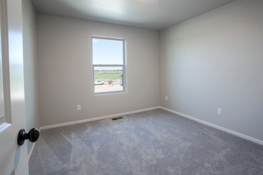 Spacious, unfurnished interior of a new home in Trailside, Timnath (Image 24).