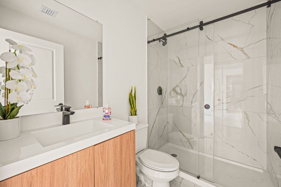 Representative furnished interior of a home built from the Model 1 M-2 by Onx Homes in On Villa Pass, Mascotte (Image 5).