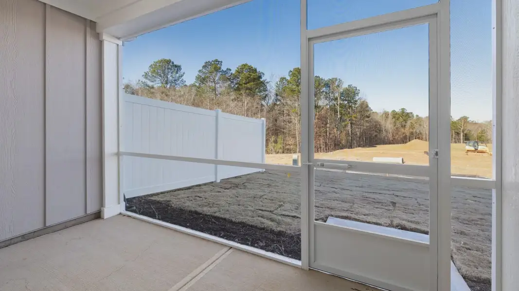 Exterior details and patio area of a home in The Courtyards at Oak Grove, Durham (Image 3).