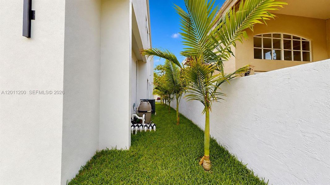 Exterior details and patio area of a home in , Miami Lakes (Image 39).