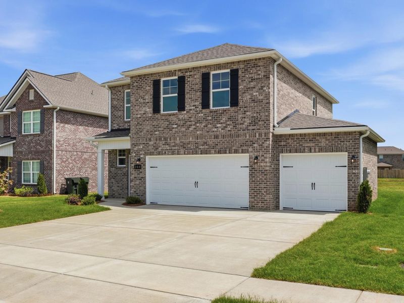 Representative exterior photo of a completed home built from the The Meadowbrook A by Davidson Homes LLC in Bailey Park, Fayetteville, TN (Image 25). Representative exterior photo of a completed home built from the The Meadowbrook A by Davidson Homes LLC in Bailey Park, Fayetteville, TN (Image 25).