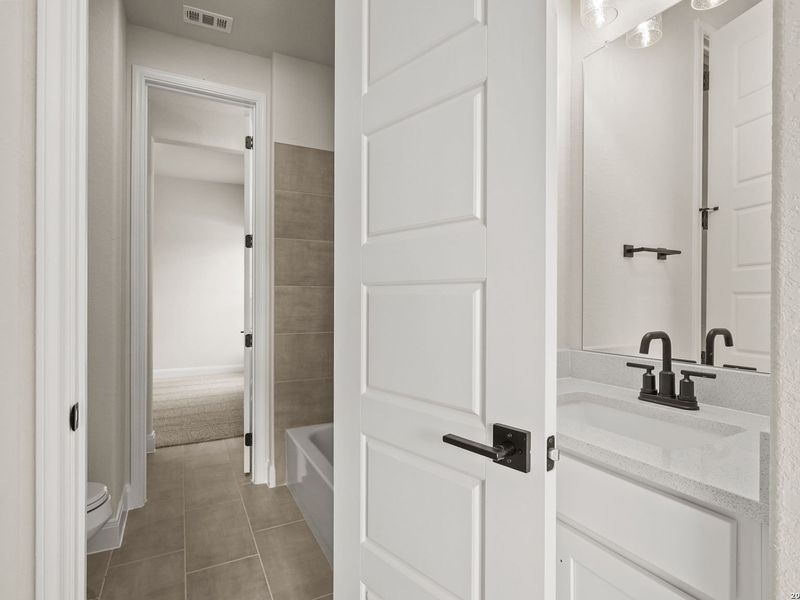 Furnished interior view inside a new home in Potranco Oaks, Castroville (Image 17).