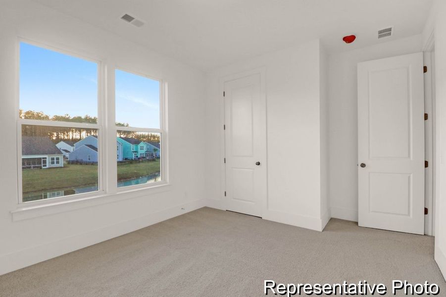 Spacious, unfurnished interior of a new home in Homecoming, Ravenel (Image 27).