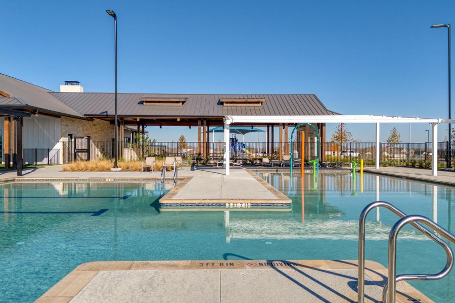 You can spend your entire summer cooling off or lounging by the community swimming pool just minutes from your front door You can spend your entire summer cooling off or lounging by the community swimming pool just minutes from your front door