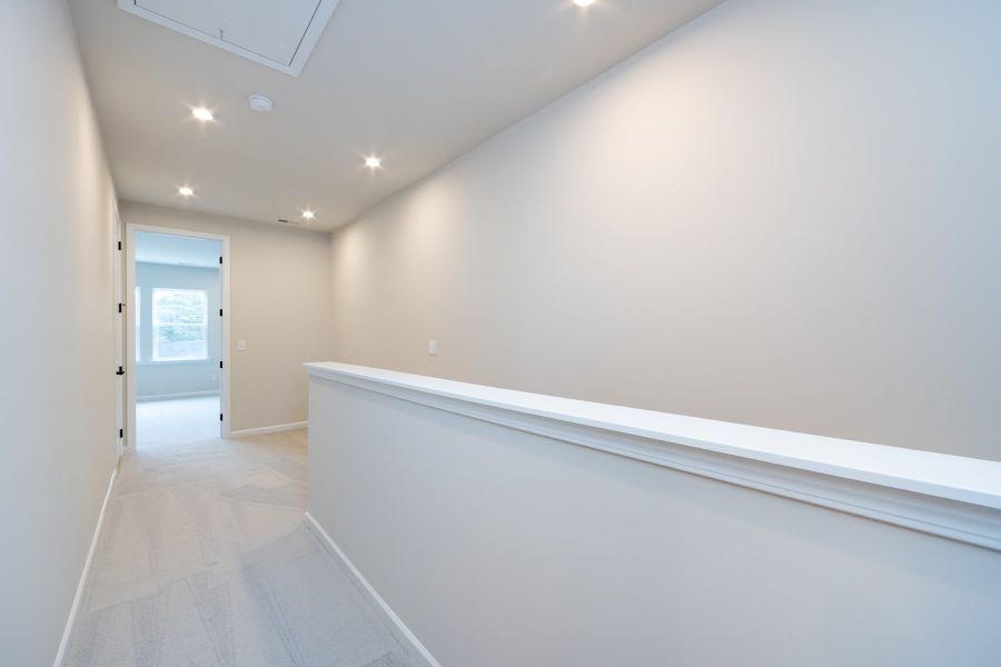 Spacious, unfurnished interior of a new home in Bellflower, Charlotte (Image 32).