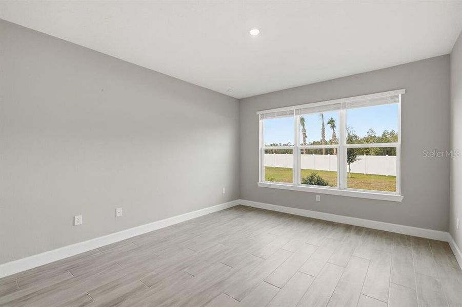 Spacious, unfurnished interior of a new home in Esplanade at Westview, Kissimmee (Image 28).