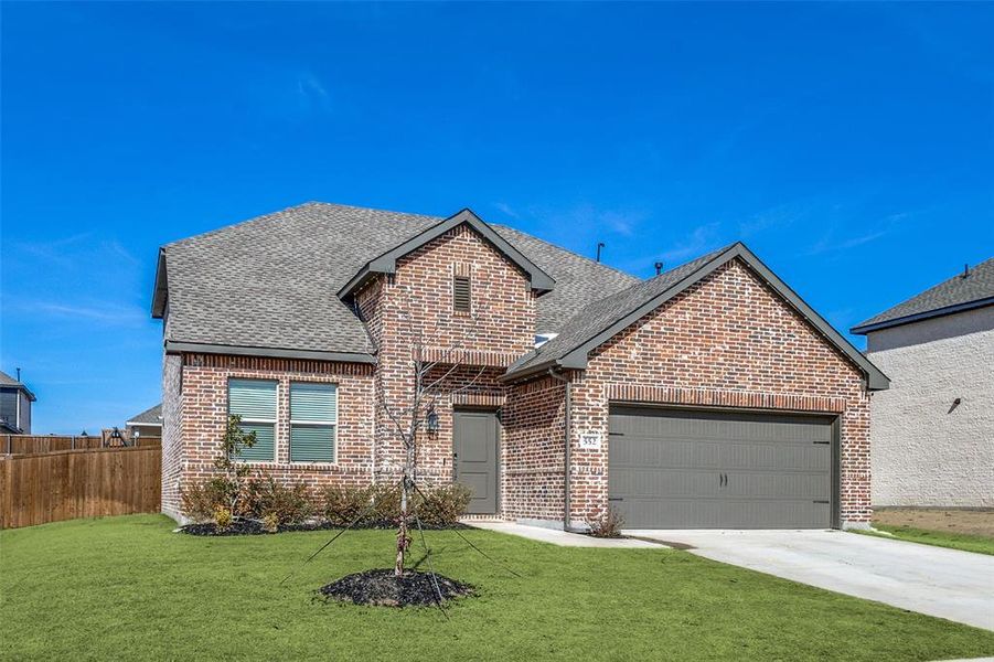 Front exterior of a new home in Rolling Ridge, Van Alstyne, TX, highlighting curb appeal (Image 2). Front exterior of a new home in Rolling Ridge, Van Alstyne, TX, highlighting curb appeal (Image 2).