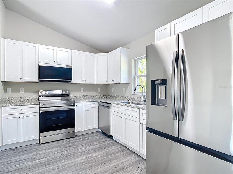 Furnished interior view inside a new home in , Punta Gorda (Image 6).