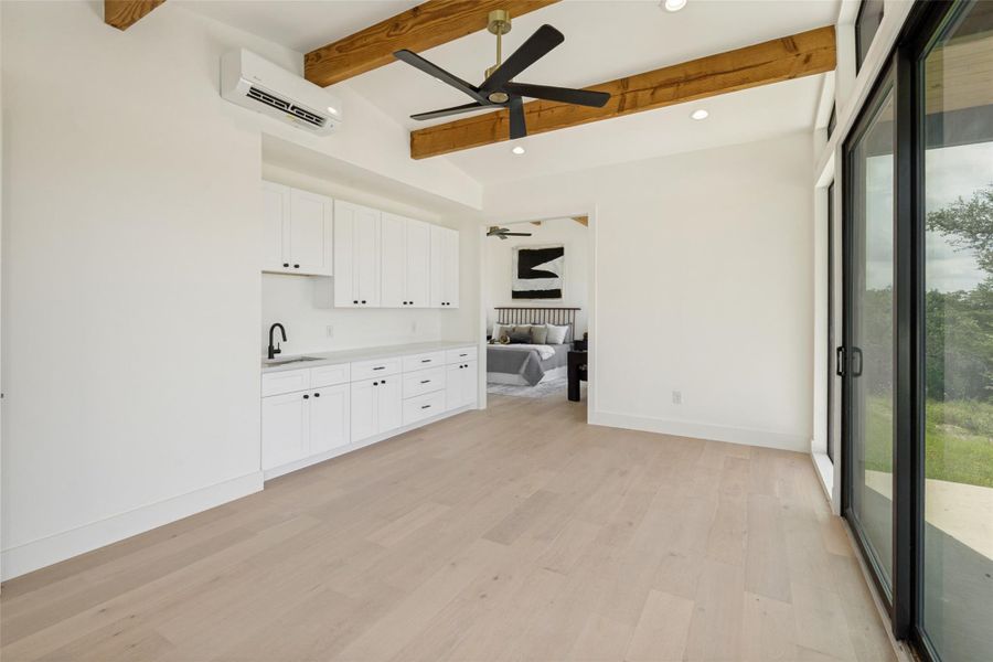 Dual vanities and a spacious shower elevate daily routines in this pristine bathroom.