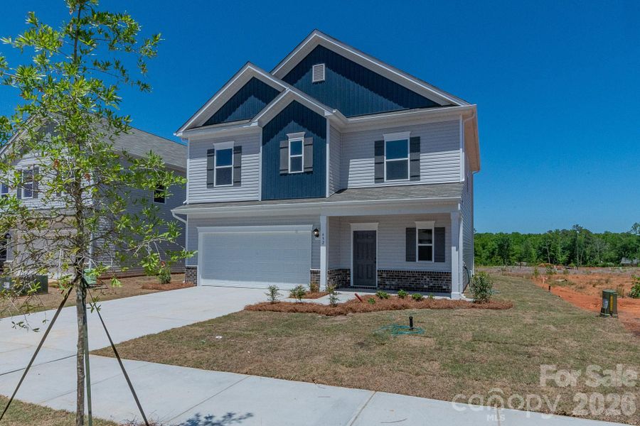 Front exterior of a new home in Winecoff, Salisbury, NC, highlighting curb appeal (Image 2). Front exterior of a new home in Winecoff, Salisbury, NC, highlighting curb appeal (Image 2).