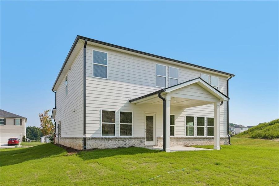 Exterior details and patio area of a home in Preserve at Mountain Creek, Pendergrass (Image 21).