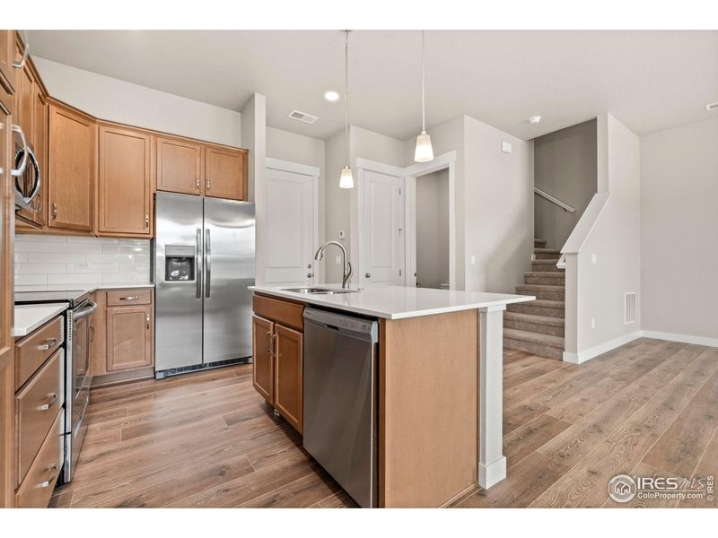 Furnished interior view inside a new home in The Lakes at Centerra - Discovery, Loveland (Image 9).