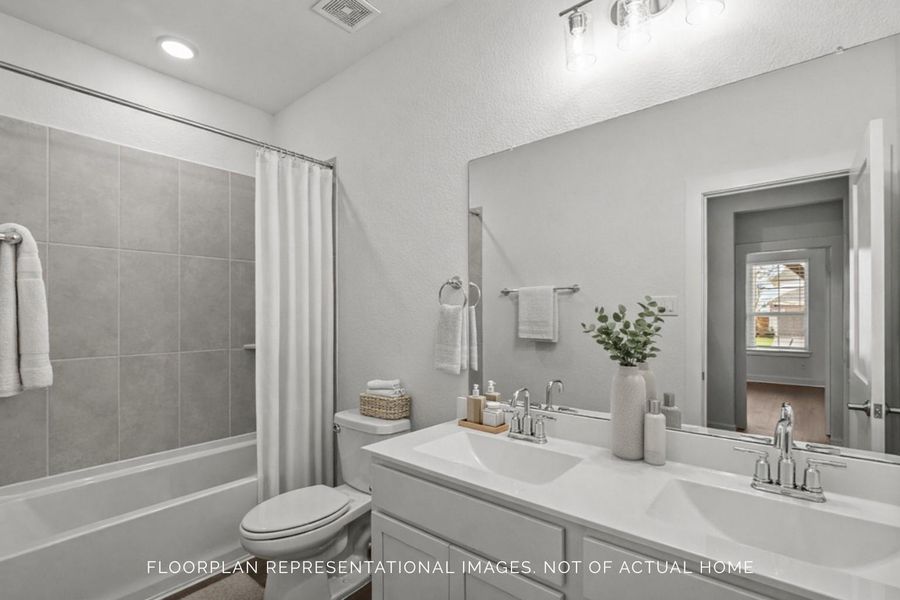 Furnished interior view inside a new home in Lone Star Landing, Montgomery (Image 13).