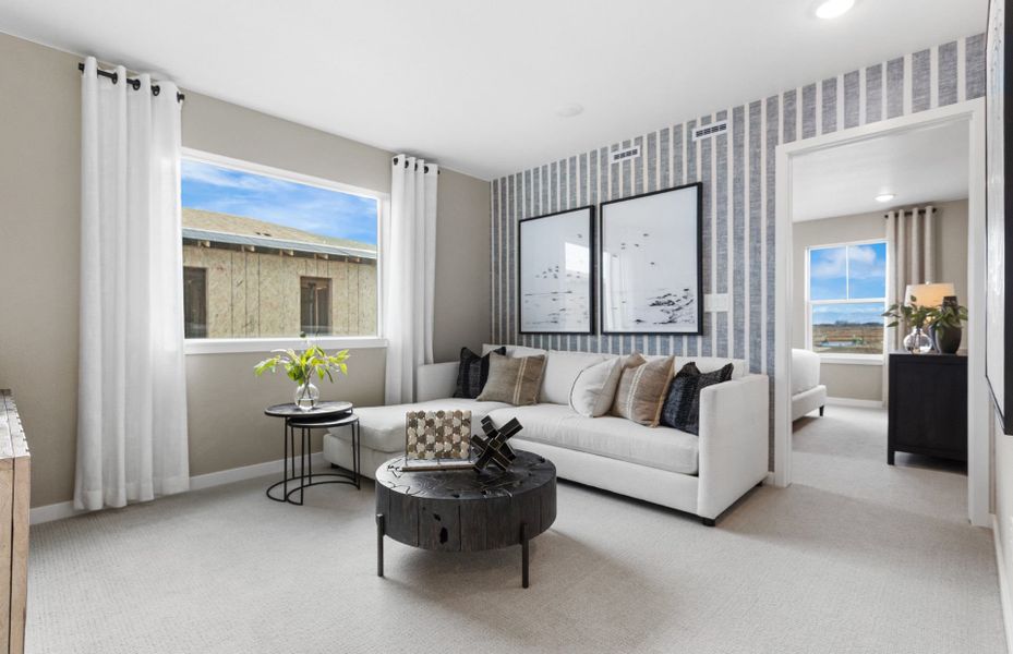 Representative furnished interior of a home built from the Rowen by Pulte Homes in Barefoot Village, Longmont (Image 12).