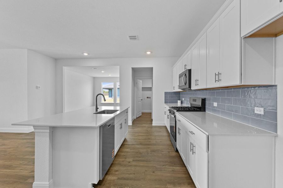 Furnished interior view inside a new home in Railhead, Cedar Creek (Image 10).
