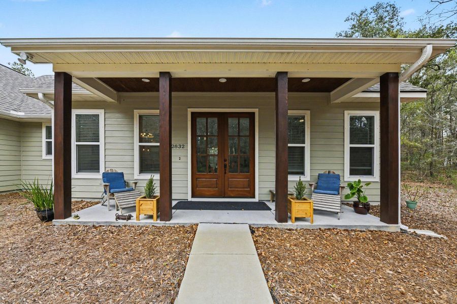 Exterior details and patio area of a home in , Johns Island (Image 21).