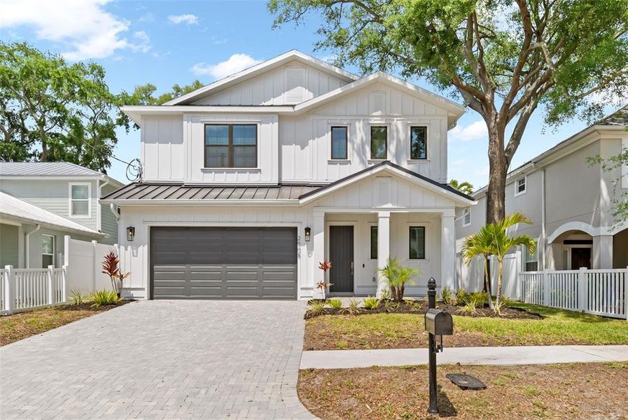 Front exterior of a new home in , Tampa, FL, highlighting curb appeal (Image 1). Front exterior of a new home in , Tampa, FL, highlighting curb appeal (Image 1).