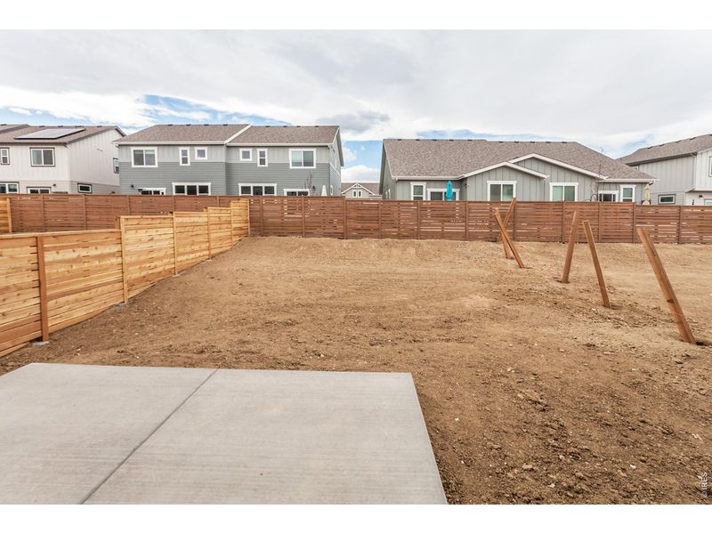 Exterior details and patio area of a home in Wilson Commons, Loveland (Image 25).