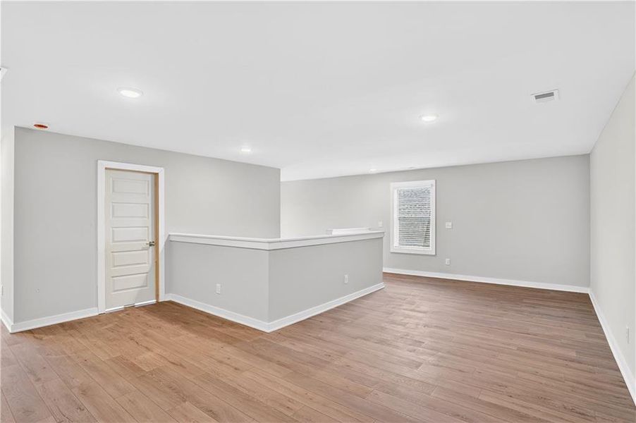 Spacious, unfurnished interior of a new home in The Fairways at Mirror Lake, Villa Rica (Image 32).
