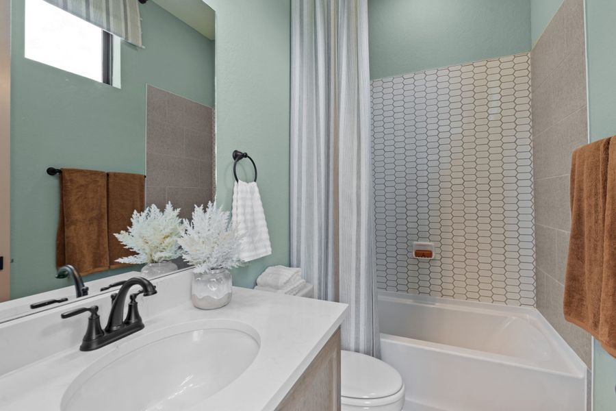 Furnished interior view inside a new home in Caliza Reserve, Boerne (Image 38).