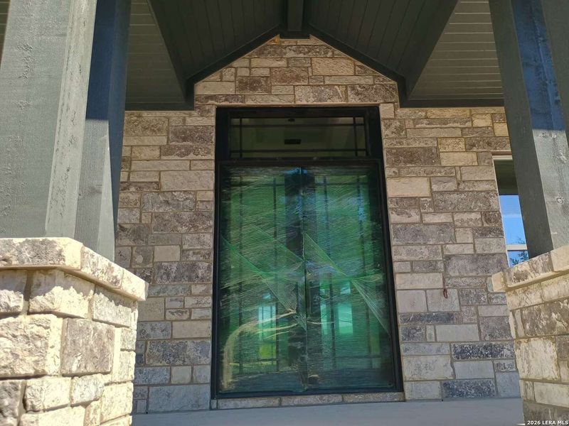 Exterior details and patio area of a home in , Fischer (Image 13).