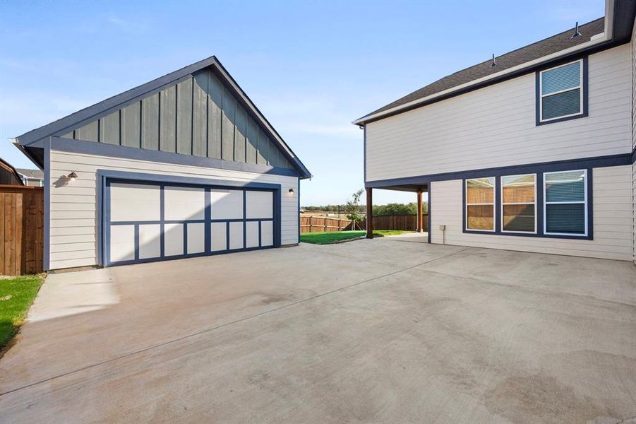 Front exterior of a new home in Heritage Towne, Grand Prairie, TX, highlighting curb appeal (Image 24).