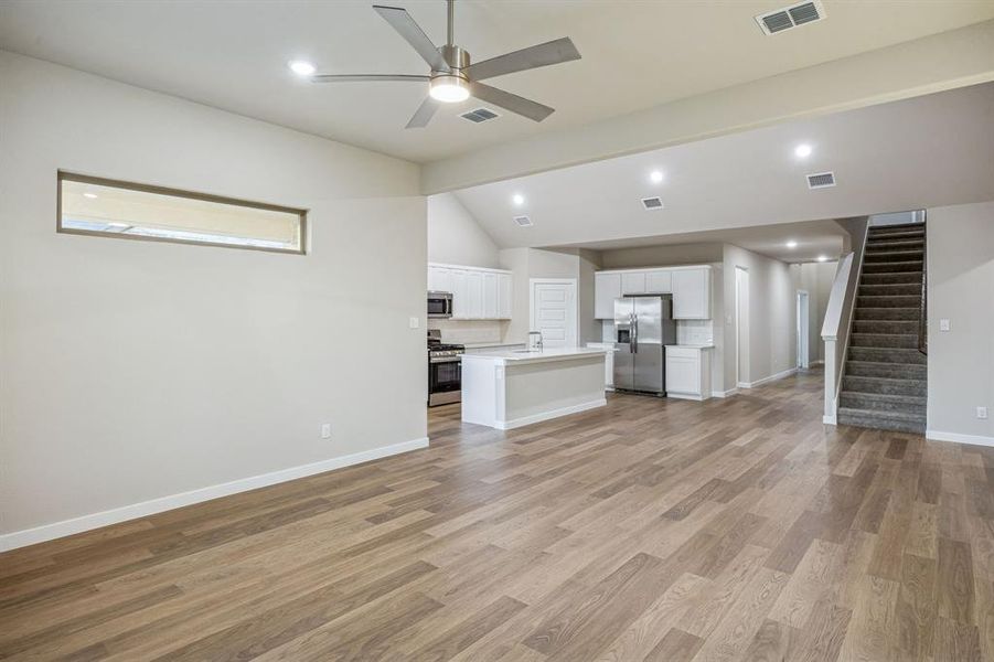 Open First Floor in the Wimbledon home plan by Trophy Signature Homes – REPRESENTATIVE PHOTO Open First Floor in the Wimbledon home plan by Trophy Signature Homes – REPRESENTATIVE PHOTO