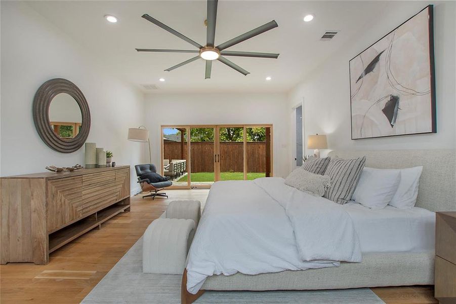 Bedroom with access to outside, light wood-style floors, recessed lighting, and a ceiling fan Bedroom with access to outside, light wood-style floors, recessed lighting, and a ceiling fan