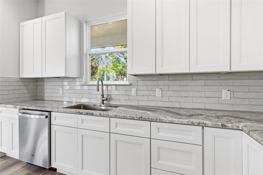 Kitchen window overlooking the covered patio
