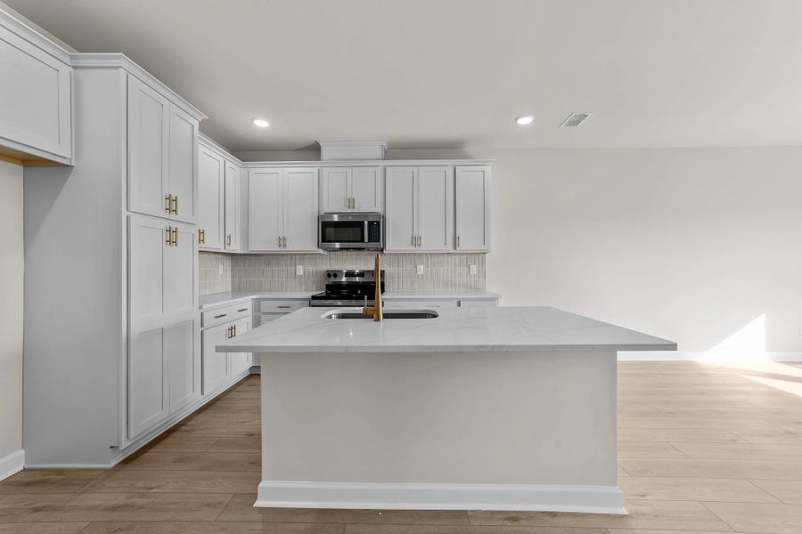Furnished interior view inside a new home in Blue Heron Retreat, Little River (Image 7).