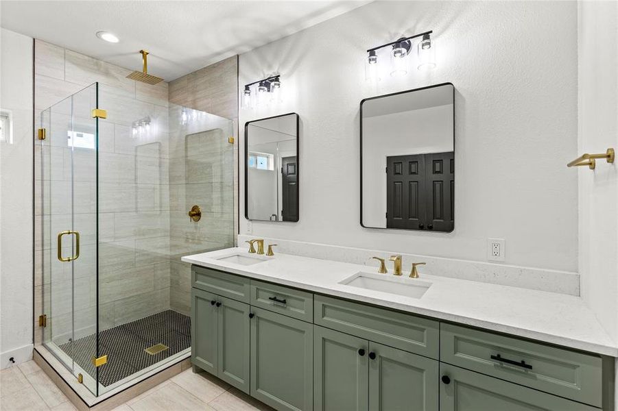 Stunning main bathroom with glass shower.