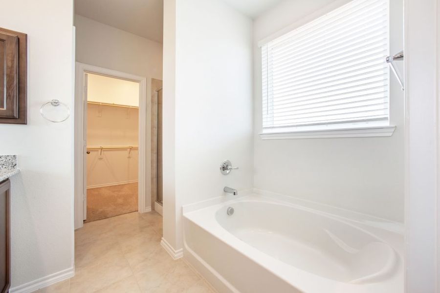 Representative exterior photo of a completed home built from the Wesley by Impression Homes in Heartland, Heartland, TX (Image 17). Representative exterior photo of a completed home built from the Wesley by Impression Homes in Heartland, Heartland, TX (Image 17).