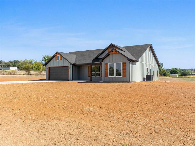 Front exterior of a new home in , Boyd, TX, highlighting curb appeal (Image 26). Front exterior of a new home in , Boyd, TX, highlighting curb appeal (Image 26).
