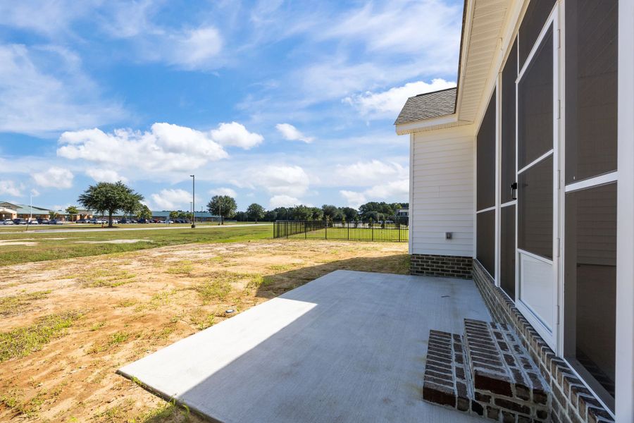 Exterior details and patio area of a home in The Preserve at Langston, Winterville (Image 29).