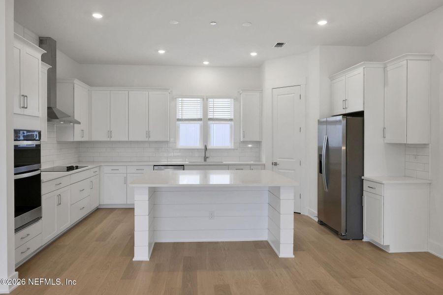 Furnished interior view inside a new home in North Beach Townhomes, Jacksonville Beach (Image 11).